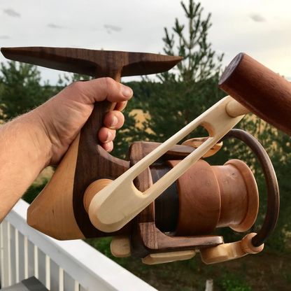 Large fishing reel carved out of wood