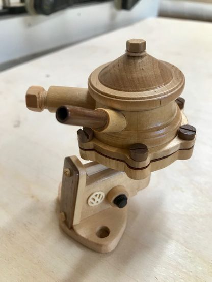 Engine part carved out of wood