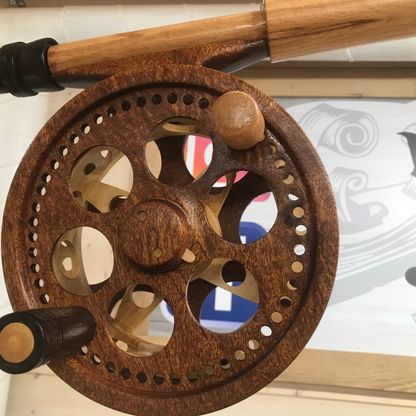 Fishing reel carved out of wood